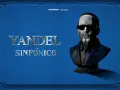 Yandel Sinfónico, un busto del artista con gafas oscuras y barba, sobre un fondo azul texturizado con adornos dorados. Iglesias Entertainment presenta.