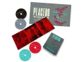 Cajas y discos de la banda Placebo, con arte de cámaras de seguridad y estética roja y azul. Incluye CDs, DVD y Blu-ray.